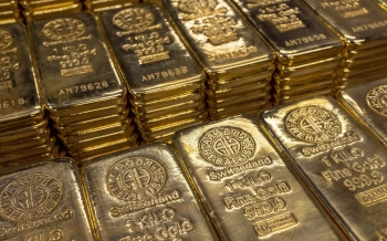 Gold adds more than $8 upon settlement